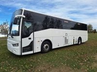 Exterior view of a BCI Classmaster bus passenger entry door used for boarding and exiting.