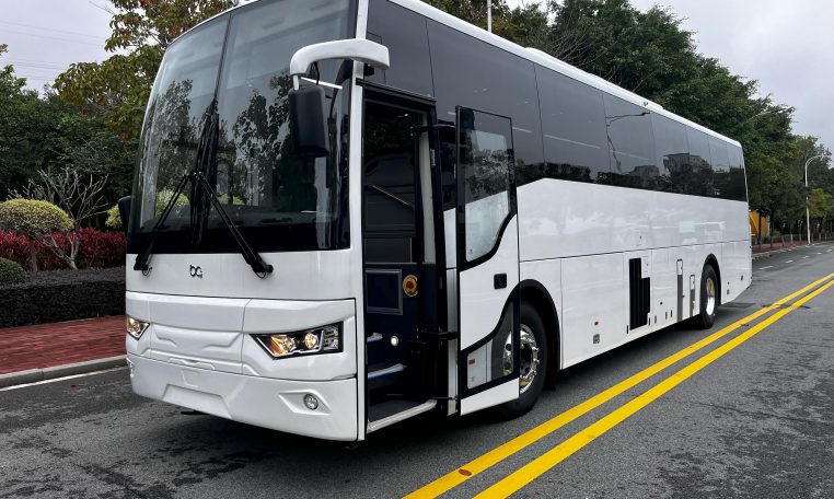 Exterior view of a BCI Classmaster bus passenger entry door used for boarding and exiting.