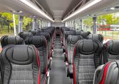 Overhead lights in a BCI Classmaster bus providing illumination for passengers.