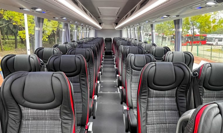 Overhead lights in a BCI Classmaster bus providing illumination for passengers.