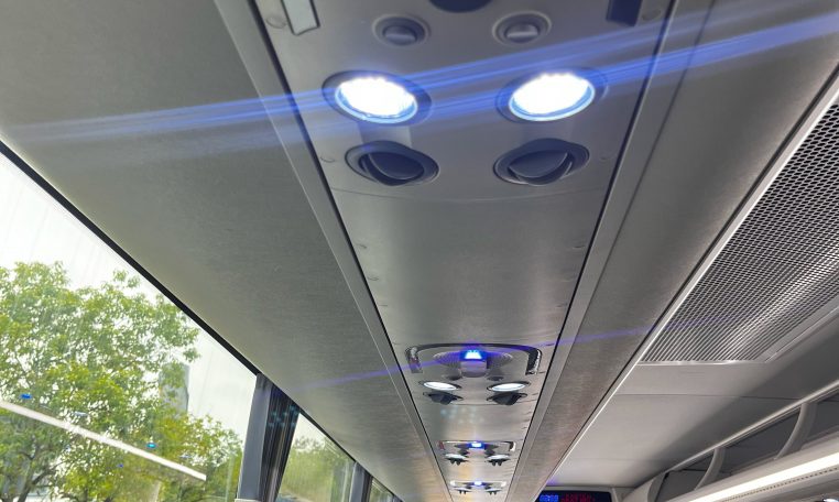 Overhead speakers in a BCI Classmaster bus providing audio announcements and entertainment for passengers.
