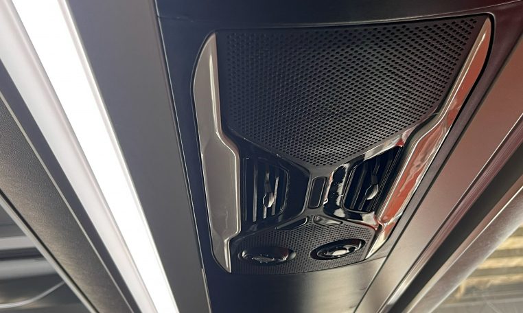 Overhead lights in a BCI Volvo B13R bus providing illumination for passengers.