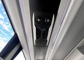 Overhead speakers in a BCI Volvo B13R bus providing audio announcements and entertainment for passengers.