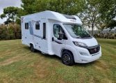 2025 Fiat Ducato Pilote P650C motorhome exterior view showing the driver's side.