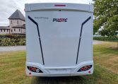 2025 Fiat Ducato Pilote P650C motorhome exterior view showing the rear side.