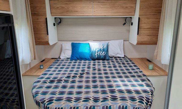 2025 Fiat Ducato Pilote P650C motorhome interior view showing the bedroom overhead storage.