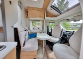 2025 Fiat Ducato Pilote P650C motorhome interior view showing the front dinette.