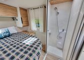 2025 Fiat Ducato Pilote P650C motorhome interior view showing the shower head and hose.