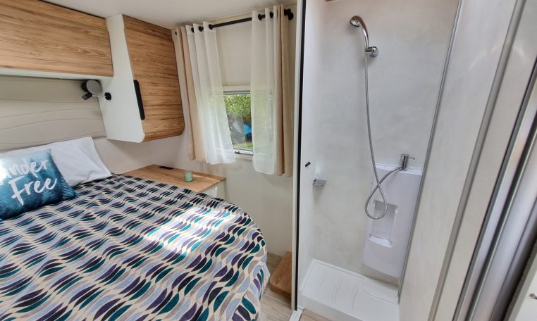 2025 Fiat Ducato Pilote P650C motorhome interior view showing the shower head and hose.