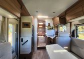2025 Fiat Ducato Pilote P746FC interior view showing the entry handrail.