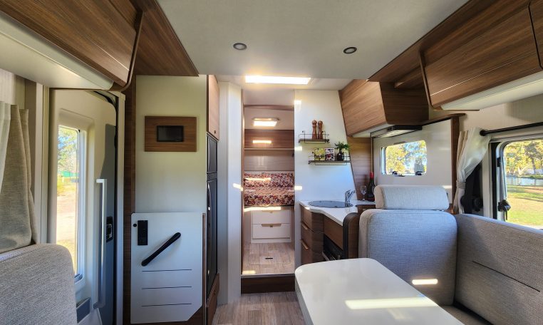 2025 Fiat Ducato Pilote P746FC interior view showing the entry handrail.
