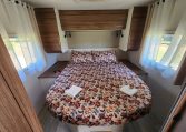 2025 Fiat Ducato Pilote P746FC interior view showing the rear island bed.