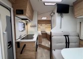 TV mounted inside the 2025 Pilote 650GJ motorhome living area.