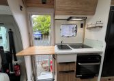 Kitchen bench extension in a 2025 Pilote 650GJ for extra workspace.