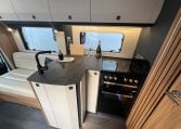2026 Auto-Trail Frontier Delaware motorhome interior view of the kitchen with hob and oven.