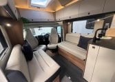 2026 Auto-Trail Frontier Delaware motorhome interior view of the front lounge and overhead cabinets for extra storage.