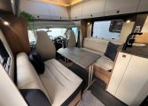 2026 Auto-Trail Frontier Delaware motorhome interior view of the front lounge and dining table.