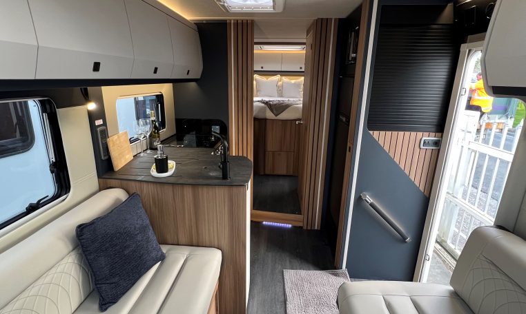 2026 Auto-Trail Frontier Delaware motorhome interior layout with front lounge and central kitchen.