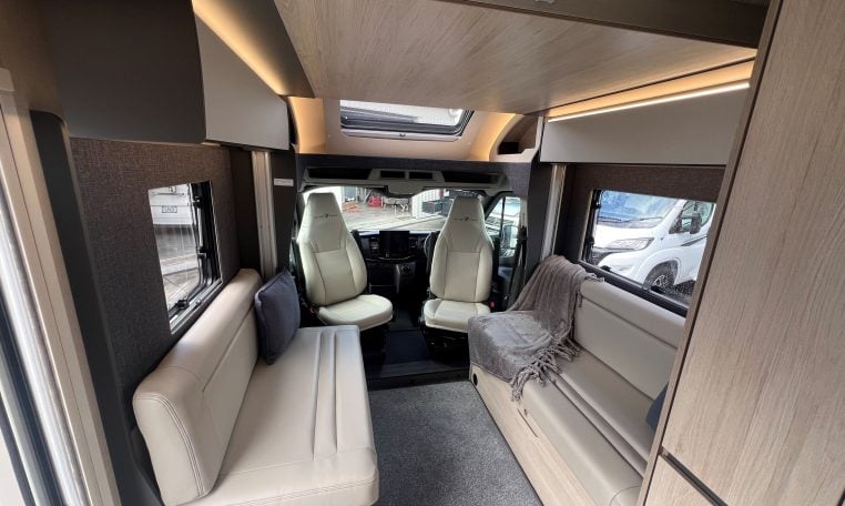 2026 Auto-Trail F-Line F62 motorhome interior showing the cab swivel seats.