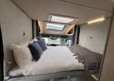 2026 Auto-Trail F-Line F62 motorhome interior showing the drop-down bed.