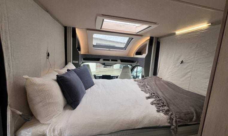 2026 Auto-Trail F-Line F62 motorhome interior showing the drop-down bed.