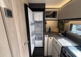 2026 Auto-Trail F-Line F62 motorhome interior showing the built-in fridge.