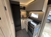 2026 Auto-Trail F-Line F62 motorhome interior showing the rear kitchen.