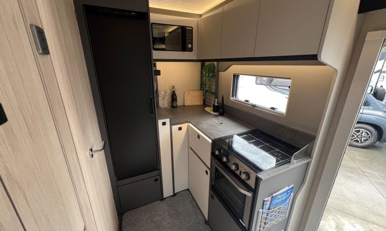 2026 Auto-Trail F-Line F62 motorhome interior showing the rear kitchen.