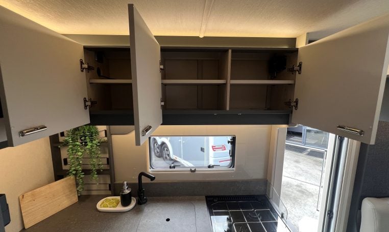 2026 Auto-Trail F-Line F62 motorhome interior showing the kitchen overhead storage.
