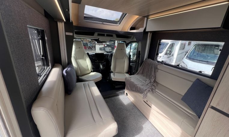 2026 Auto-Trail F-Line F62 motorhome interior showing the front lounge bench seating.