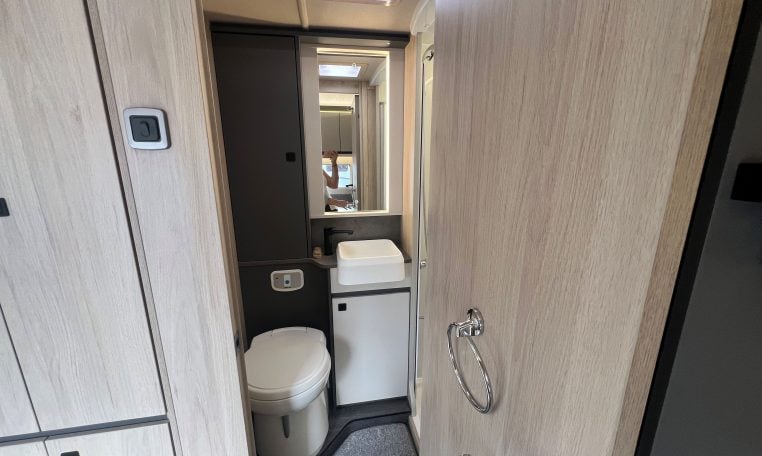 2026 Auto-Trail F-Line F62 motorhome interior showing the compact toilet.