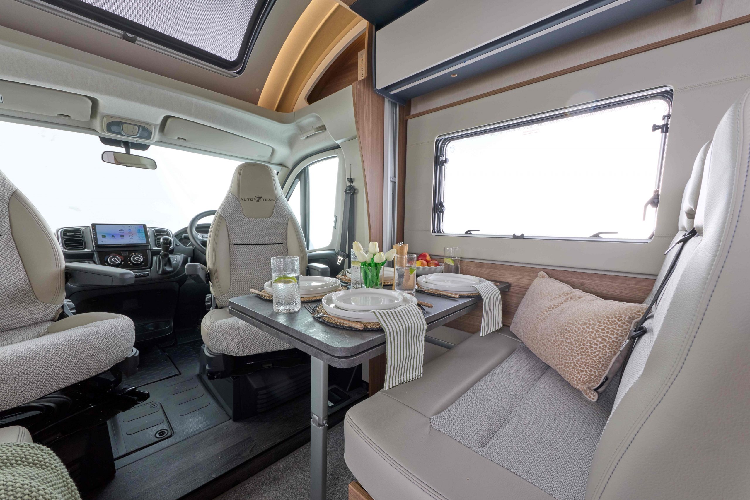 2026 - Auto-Trail Imala 730 - Interior Captian Chairs 2026 Auto Trail Imala 730 interior front dining room