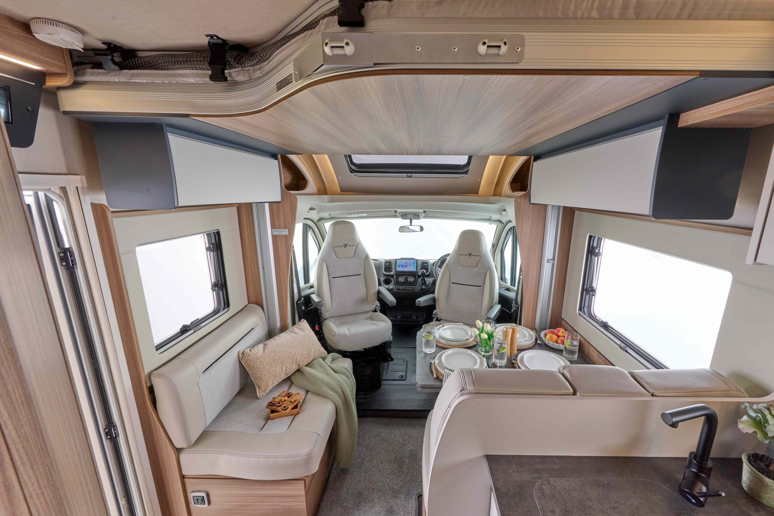 2026 - Auto-Trail Imala 730 - Interior Front Drop Down Bed 2026 Auto Trail Imala 730 interior with front dining view