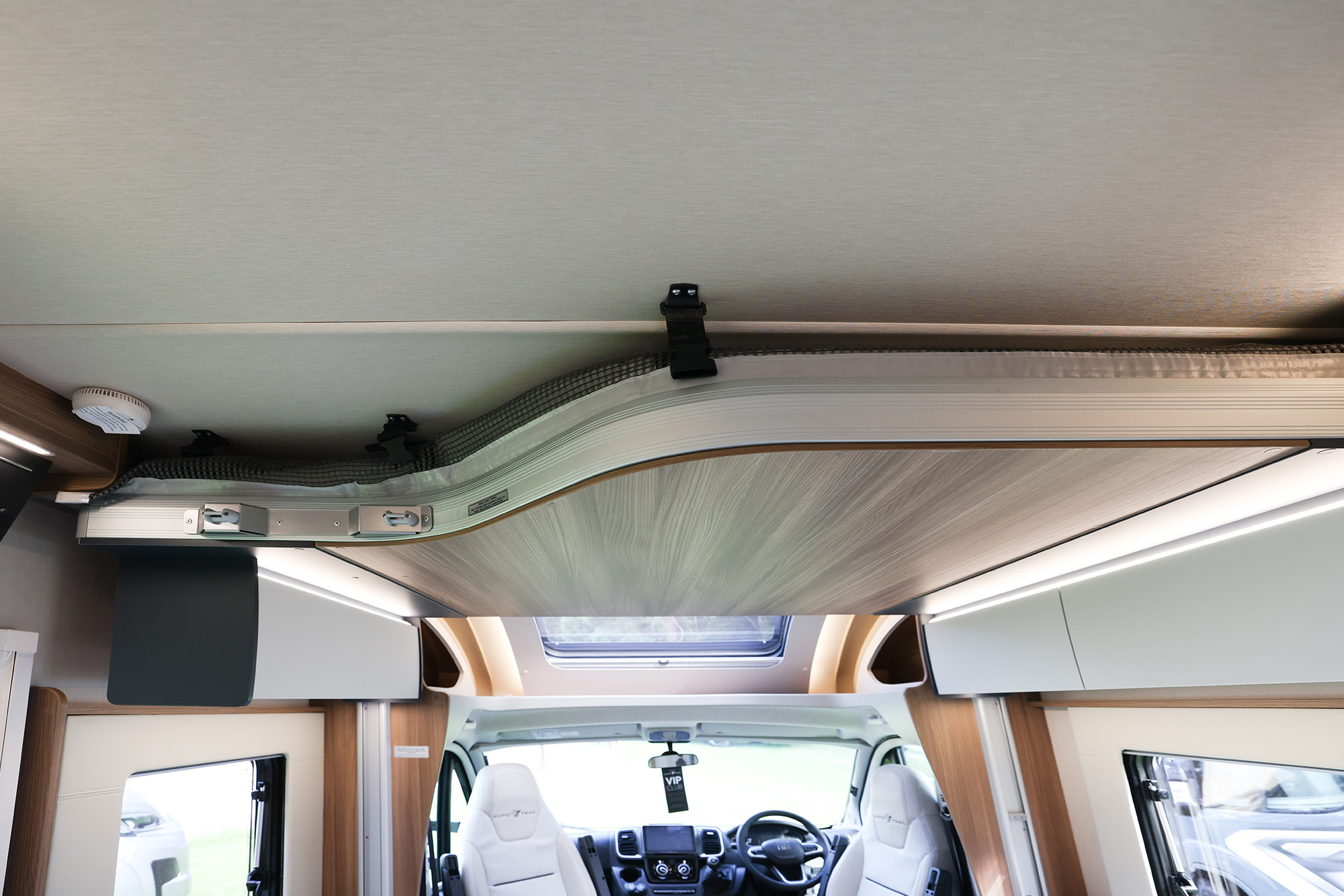 Drop-down bed raised neatly against the ceiling in the 2026 Auto-Trail Imala 736 motorhome.