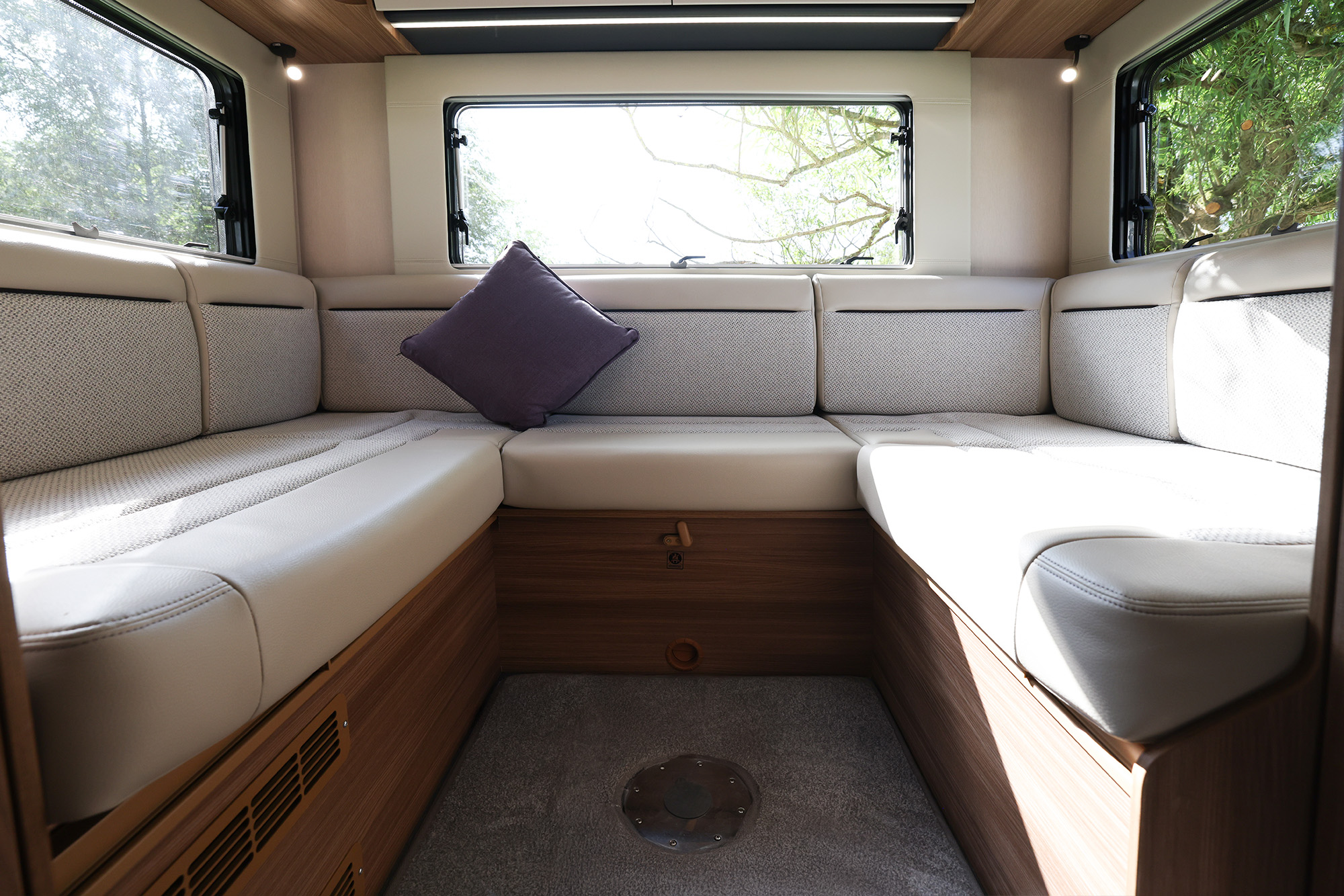 2026 Auto-Trail Imala 736 motorhome rear U-shaped lounge with spacious seating, large windows and a bright, comfortable social area.