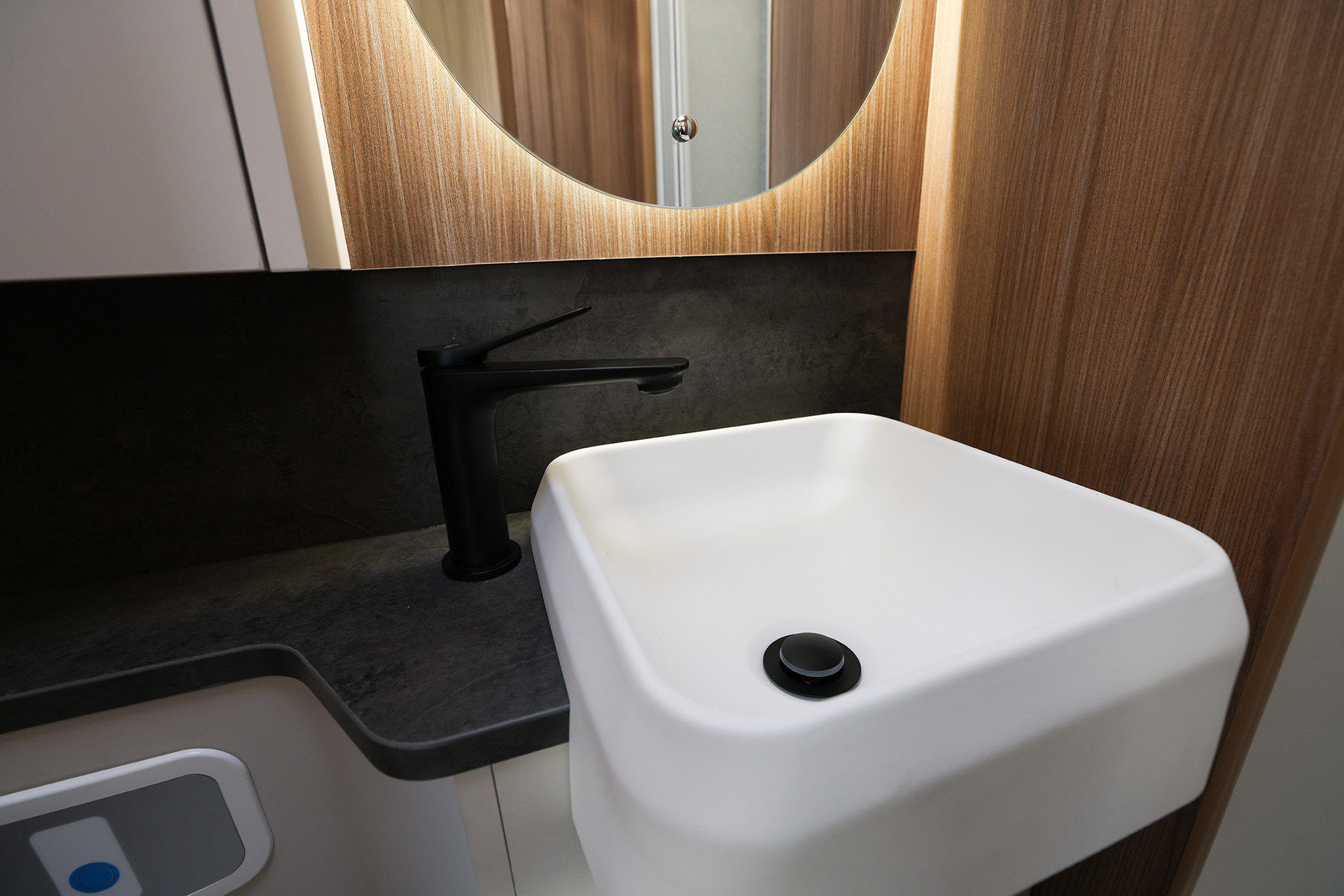 Spacious separate bathroom inside the Auto-Trail Imala 736 motorhome, featuring modern fittings and bright lighting.