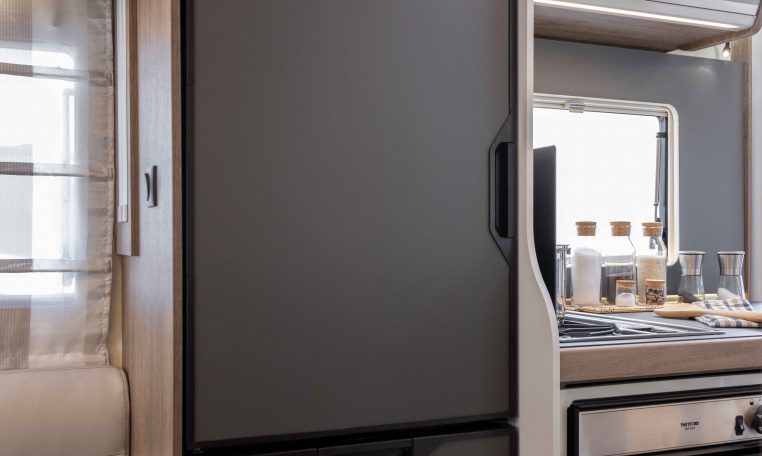 2026 Roller Team T-Line 700 interior view showing the built-in fridge.