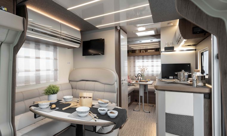 2026 Roller Team T-Line 700 interior view showing the front dining table.