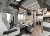 2026 Roller Team T-Line 700 interior view showing the front dining with swivel seats.