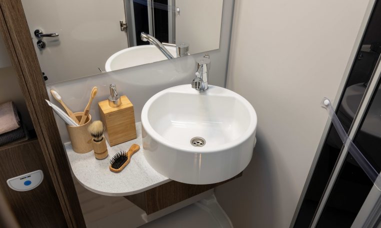 2026 Roller Team T-Line 700 interior view showing the bathroom handbasin.