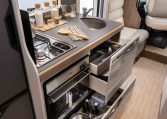2026 Roller Team T-Line 700 interior view showing the kitchen storage.