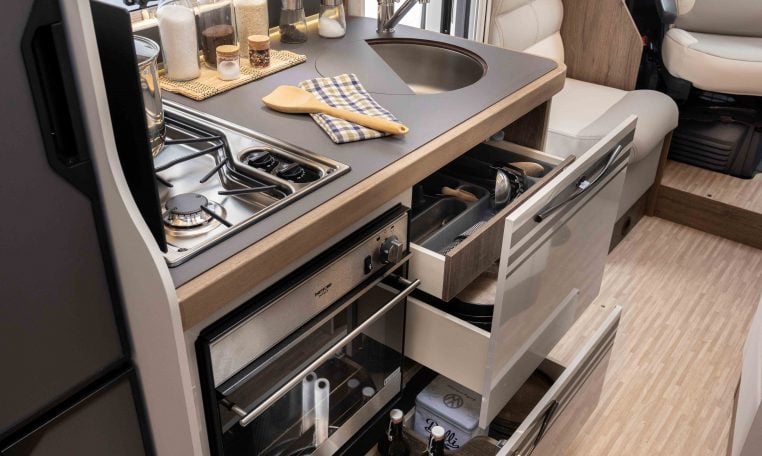 2026 Roller Team T-Line 700 interior view showing the kitchen storage.