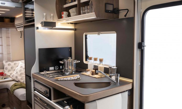 2026 Roller Team T-Line 700 interior view showing the kitchen storage drawers.