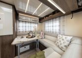 2026 Roller Team T-Line 700 interior view showing the rear lounge luxury upholstery.