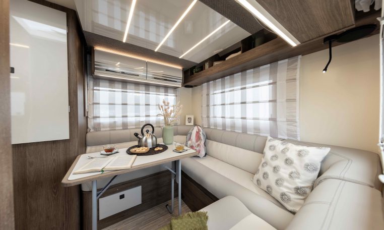 2026 Roller Team T-Line 700 interior view showing the rear lounge luxury upholstery.