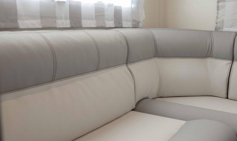 2026 Roller Team T-Line 700 interior view showing the rear lounge seating.