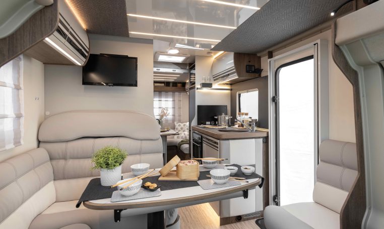 2026 Roller Team T-Line 700 interior view showing the rear lounge TV.