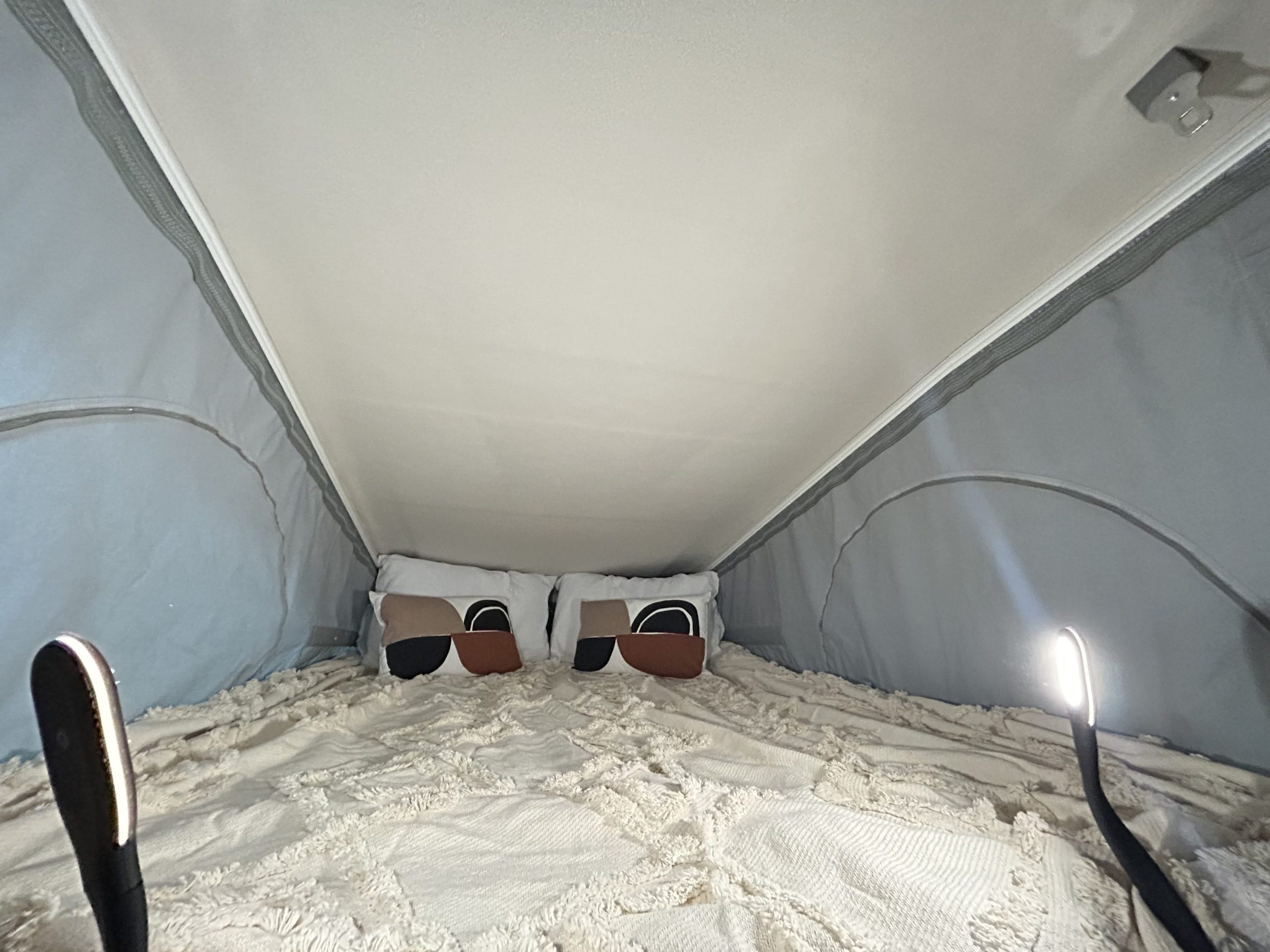 2026-auto-trail-expedition-68-interior-pop-top-bed-portrait