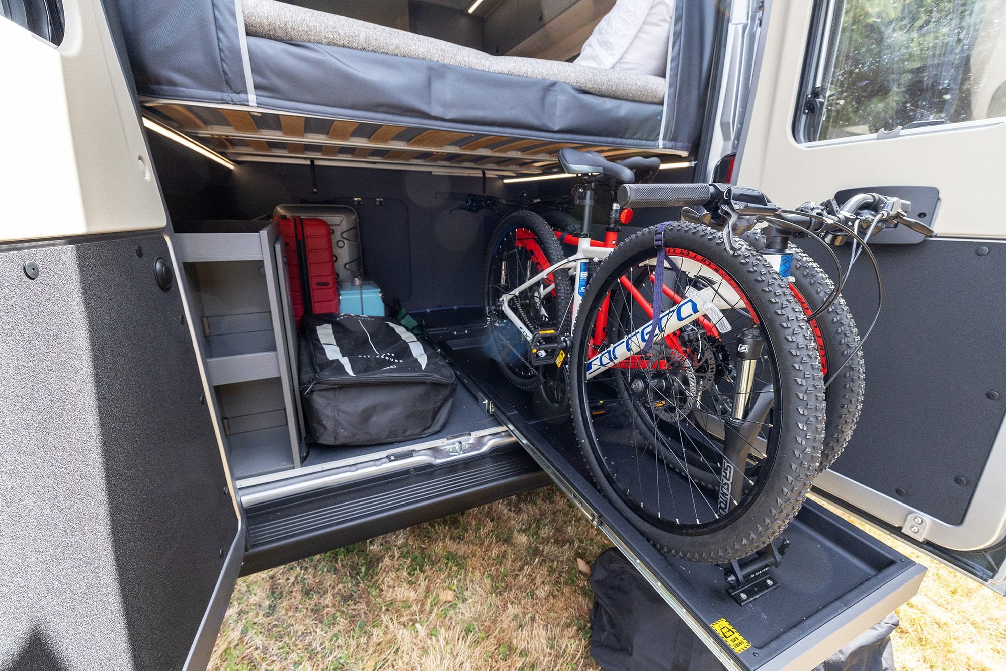2026-auto-trail-expedition-68-xl-interior-garage-bikes-out