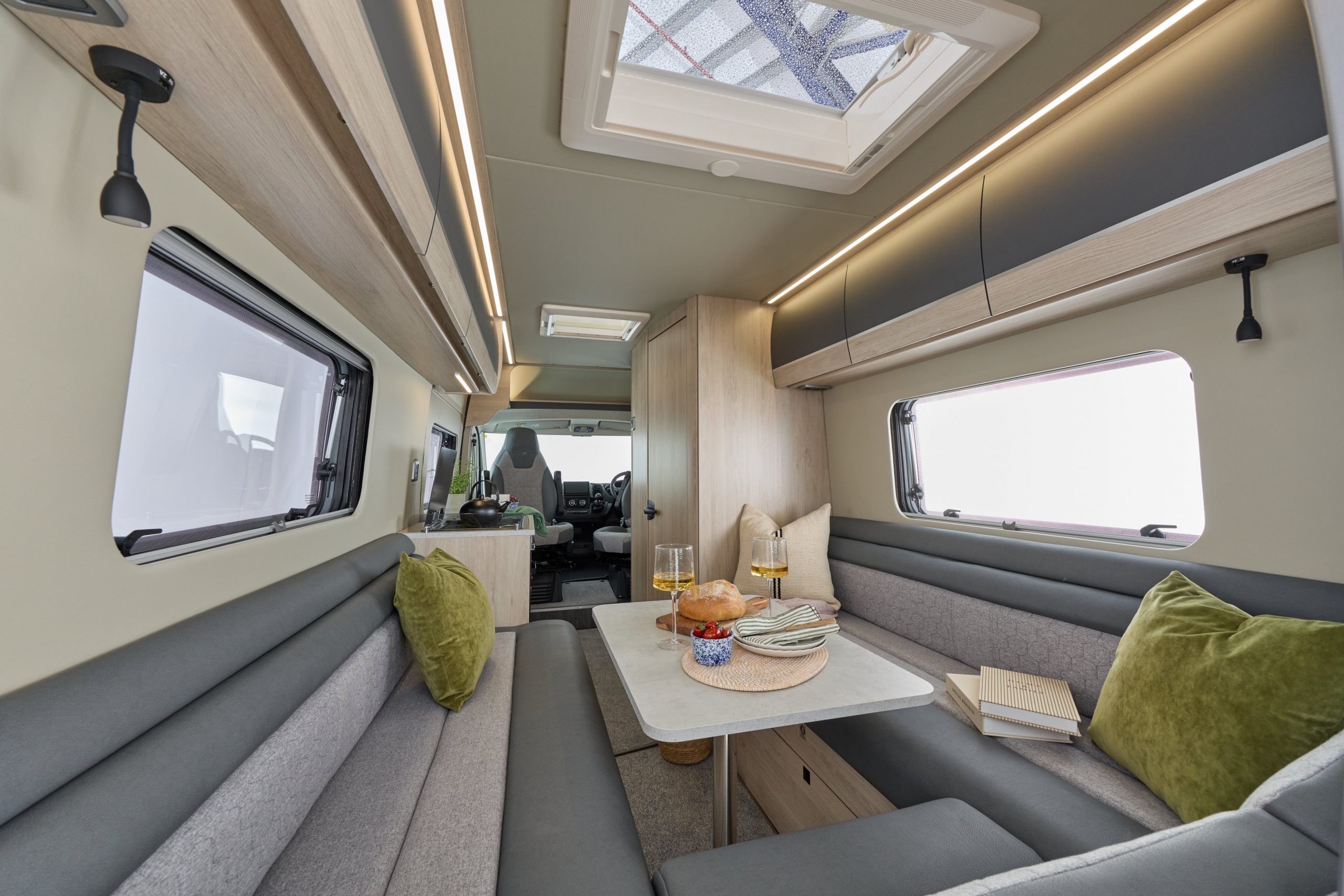 2026 – Auto-Trail – Expedition – 66 – Interior Lounge Dining Wide 2026 Auto-Trail Expedition Van lounge with table